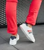 Białe skórzane wiązane sneakersy Camilla